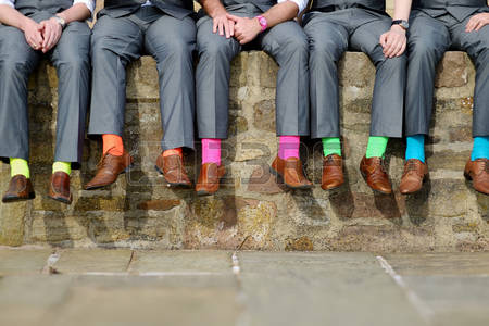40740354-funny-colorful-socks-of-groomsmen